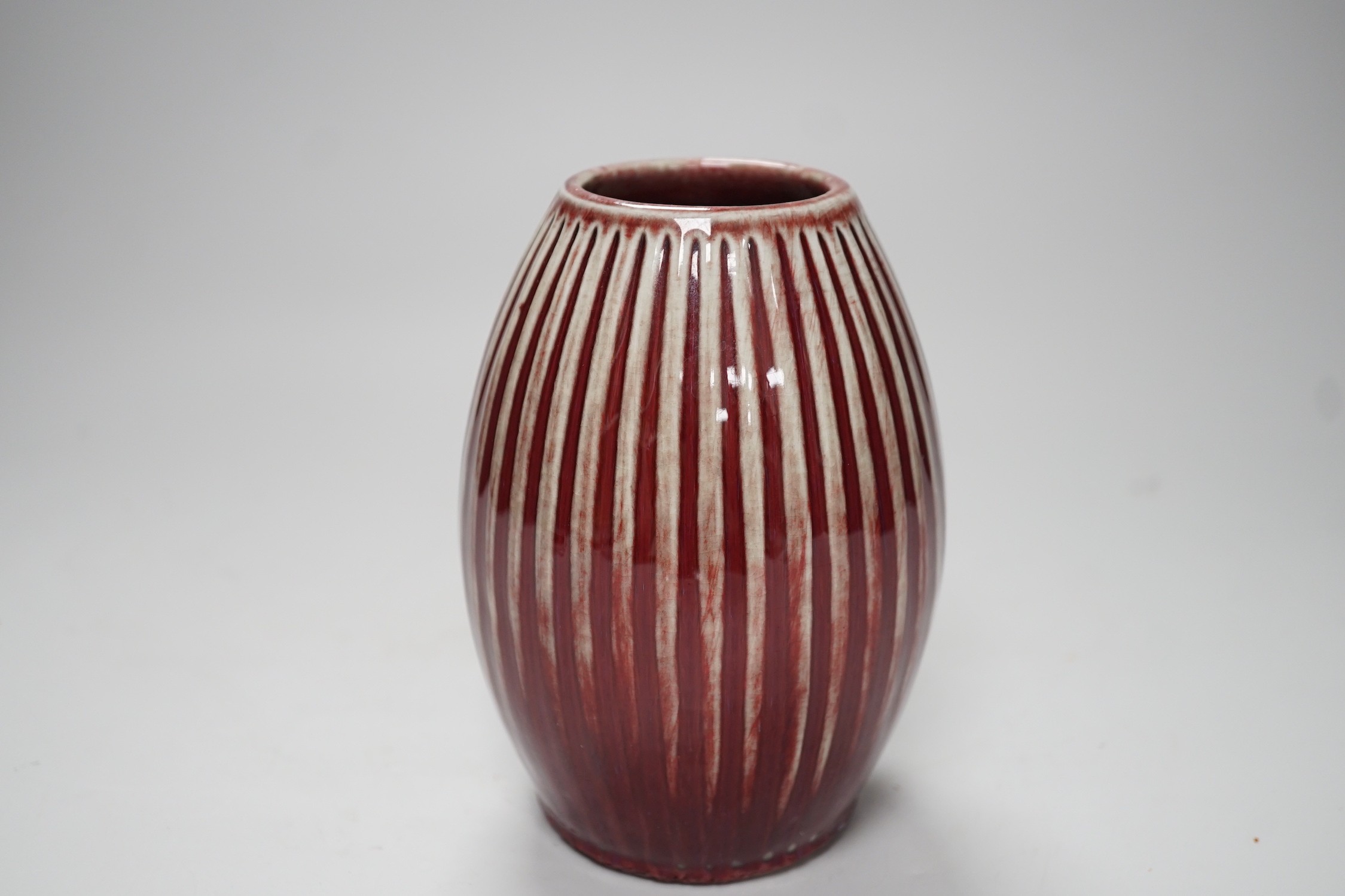 A Chinese Sang De Boeuf vase, 15cm